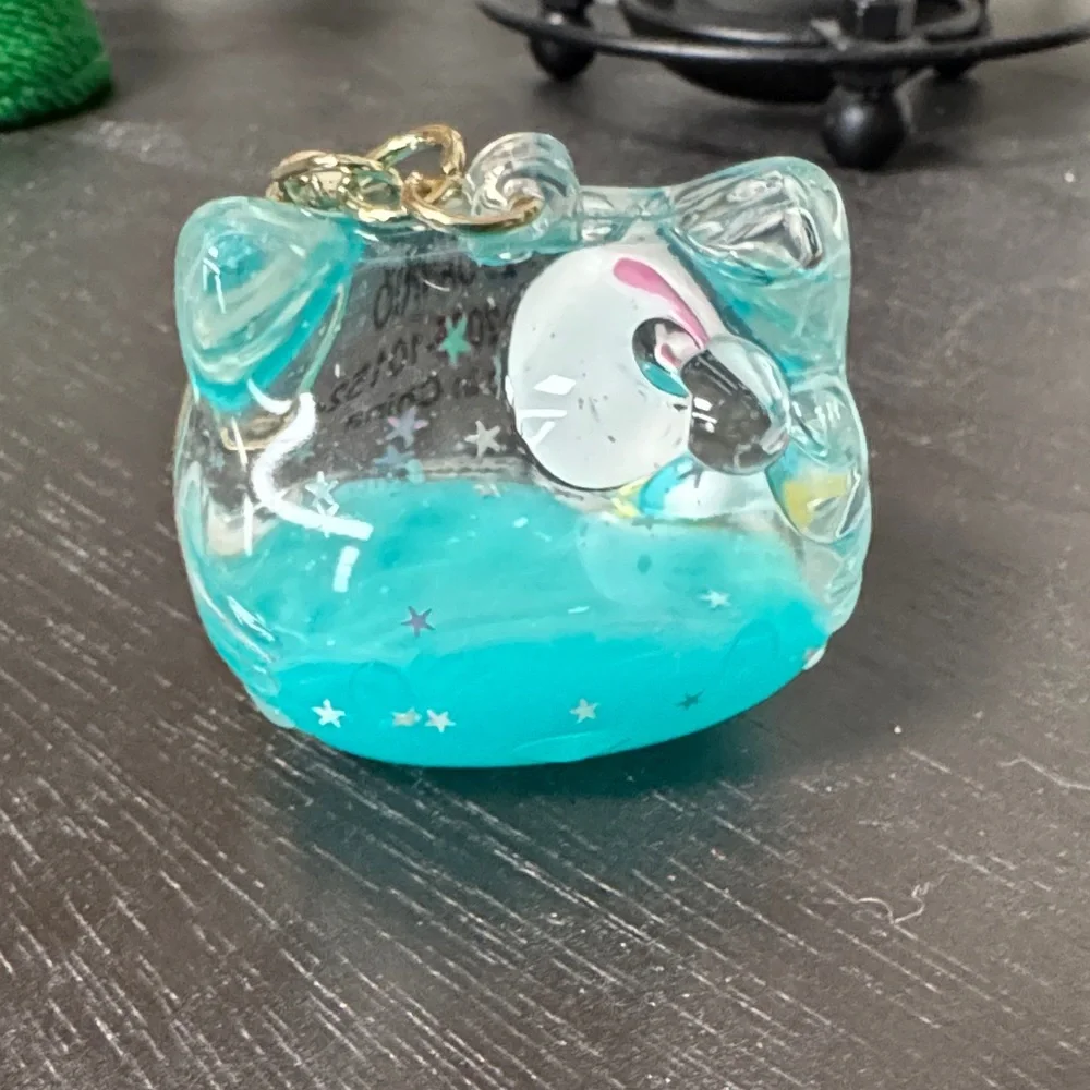 Sanrio Hello Kitty Snowglobe keychain and credit card stickers - Picture 3 of 6